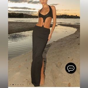 Black maxi dress with gold ring and cut outs